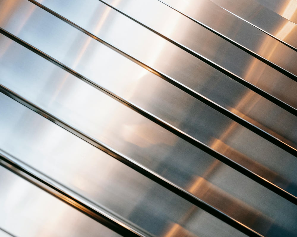 Close-up of stainless steel healthcare door hardware with corrosion-resistant finish