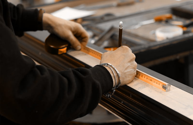 Engineers verifying lock durability and structure in the testing laboratory